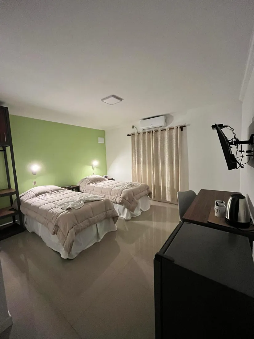Habitación con camas individuales en La Posada del Mister
